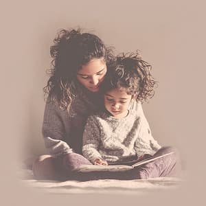 Mother and child reading together